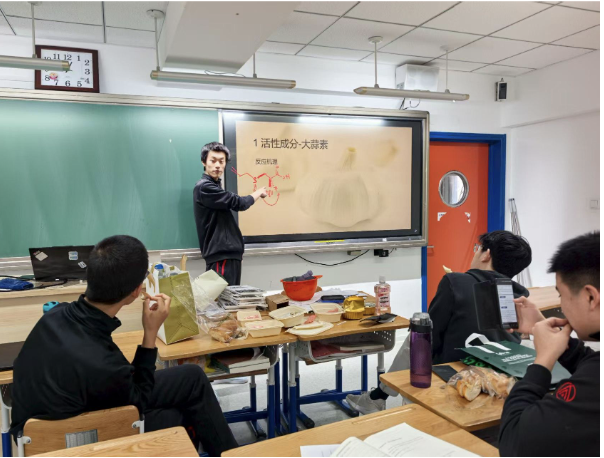 Daniel presenting course content in class